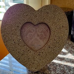 Handmade Heart-shaped picture frame.